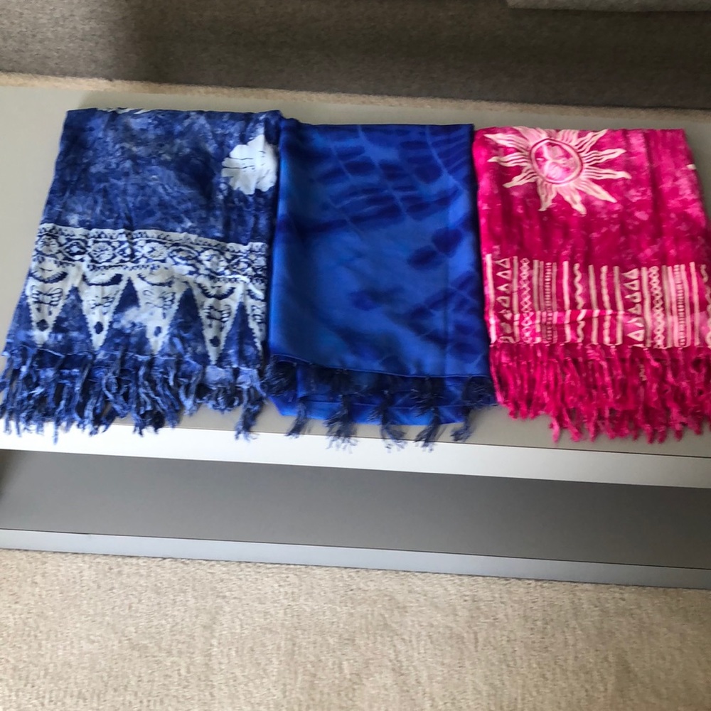 These items are SOLD!! 3 Pretty bathing suit wraps!